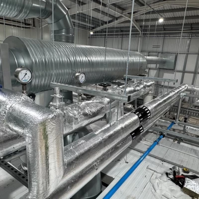 Silver pipework showing refrigeration system pipework