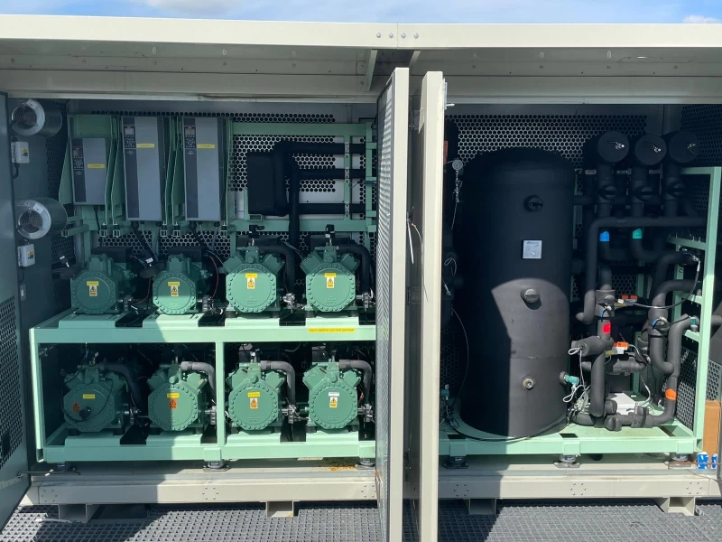 What a BIS+ system looks like includes green cylinders and a black tank