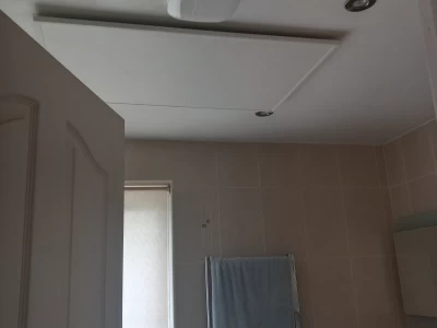 Image Captioned: Bathroom infrared heating from Carbon Reduction Solutions.