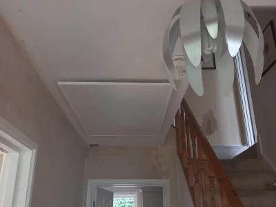 Image Captioned: Hallway infrared heating from Carbon Reduction Solutions.