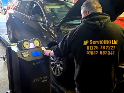 Image Captioned: Andy of AP Servicing performing aircon diagnostics.