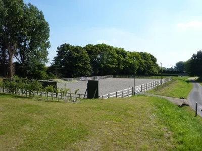 Image Captioned: Riding arena in Area of Outstanding Natural Beauty