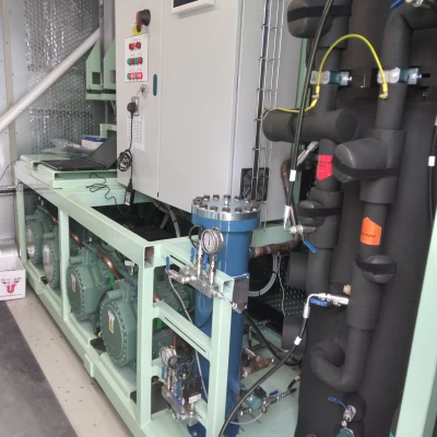 Inside of refrigeration rack system showing multiple compressors