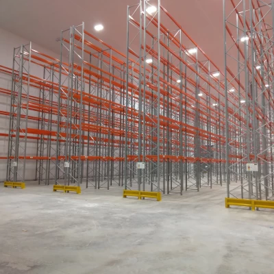 Metal and orange racks for storing chilled food in distribution centre
